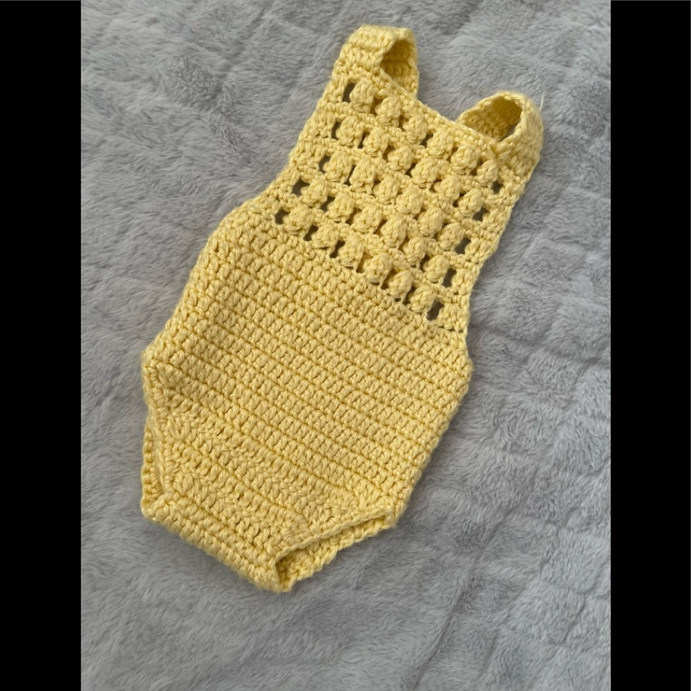 Hand-knitted.  Yellow color.  size 0-3